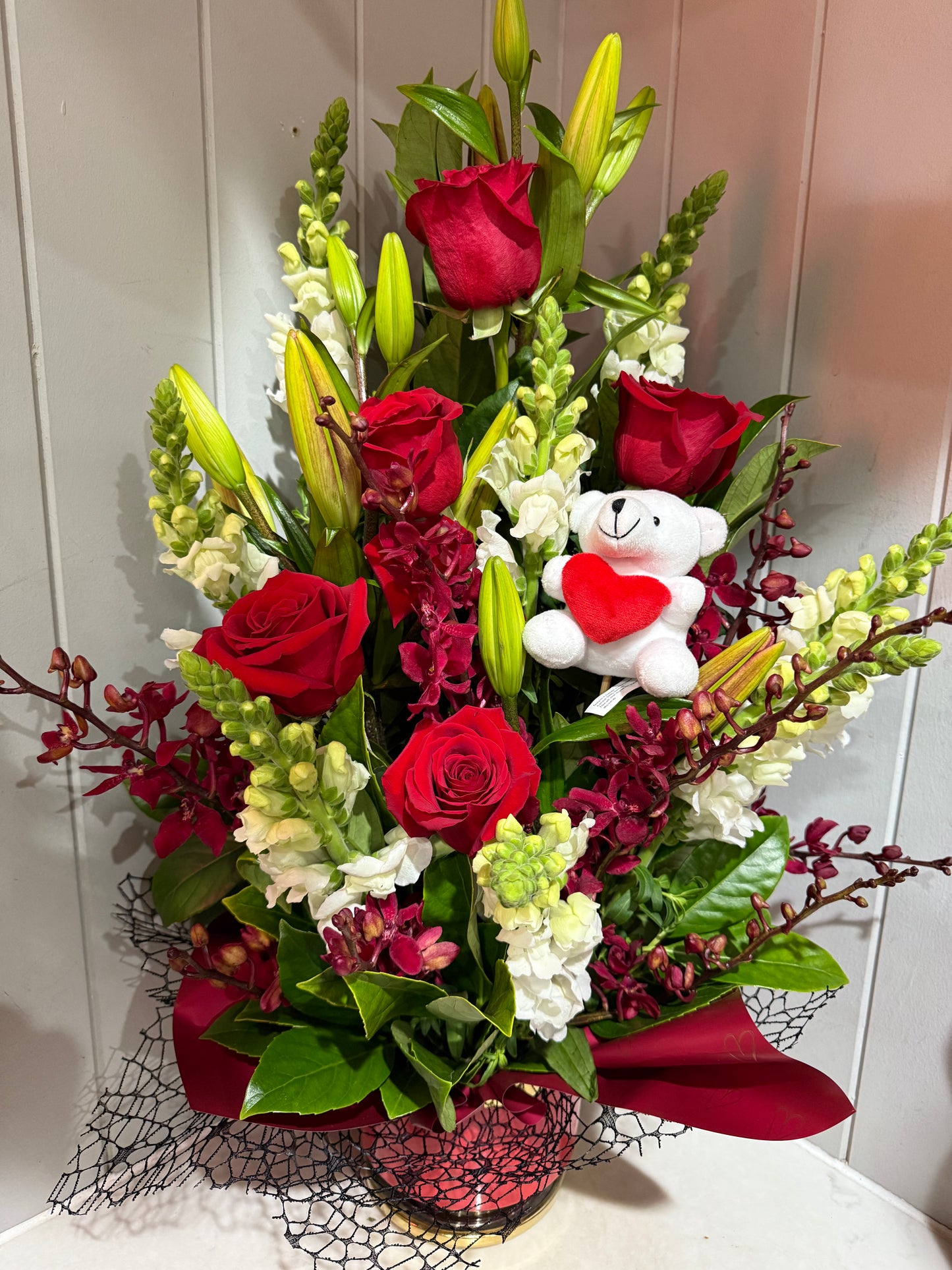 Red roses with teddy